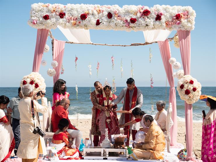 A colorful wedding ceremony photographed by Live Picture Studios
