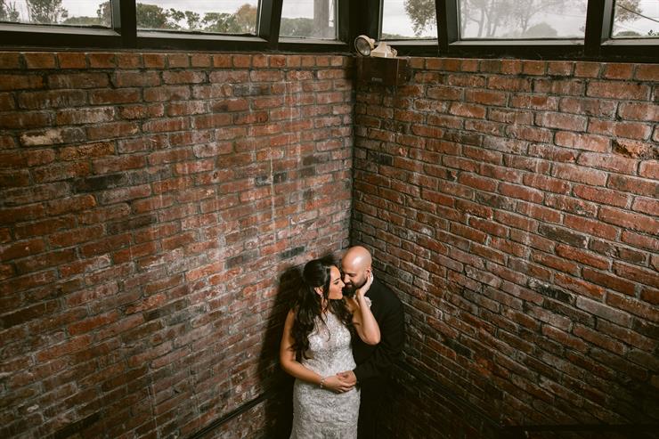 A newlywed couple sharing a quiet moment