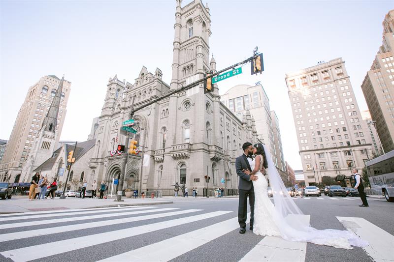 A newlywed couple photographed on a New York City street